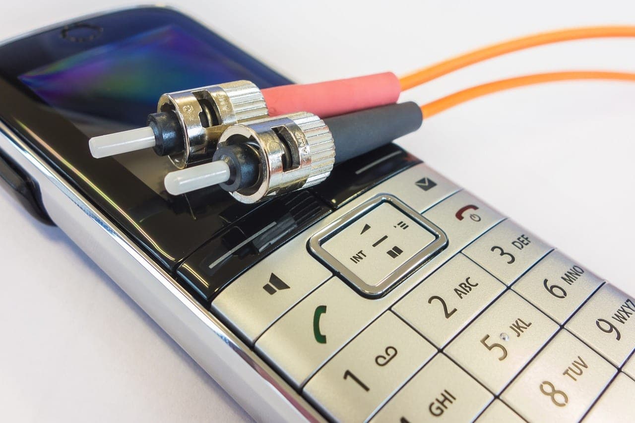 Glowing fiber optic cables transmitting massive data sets