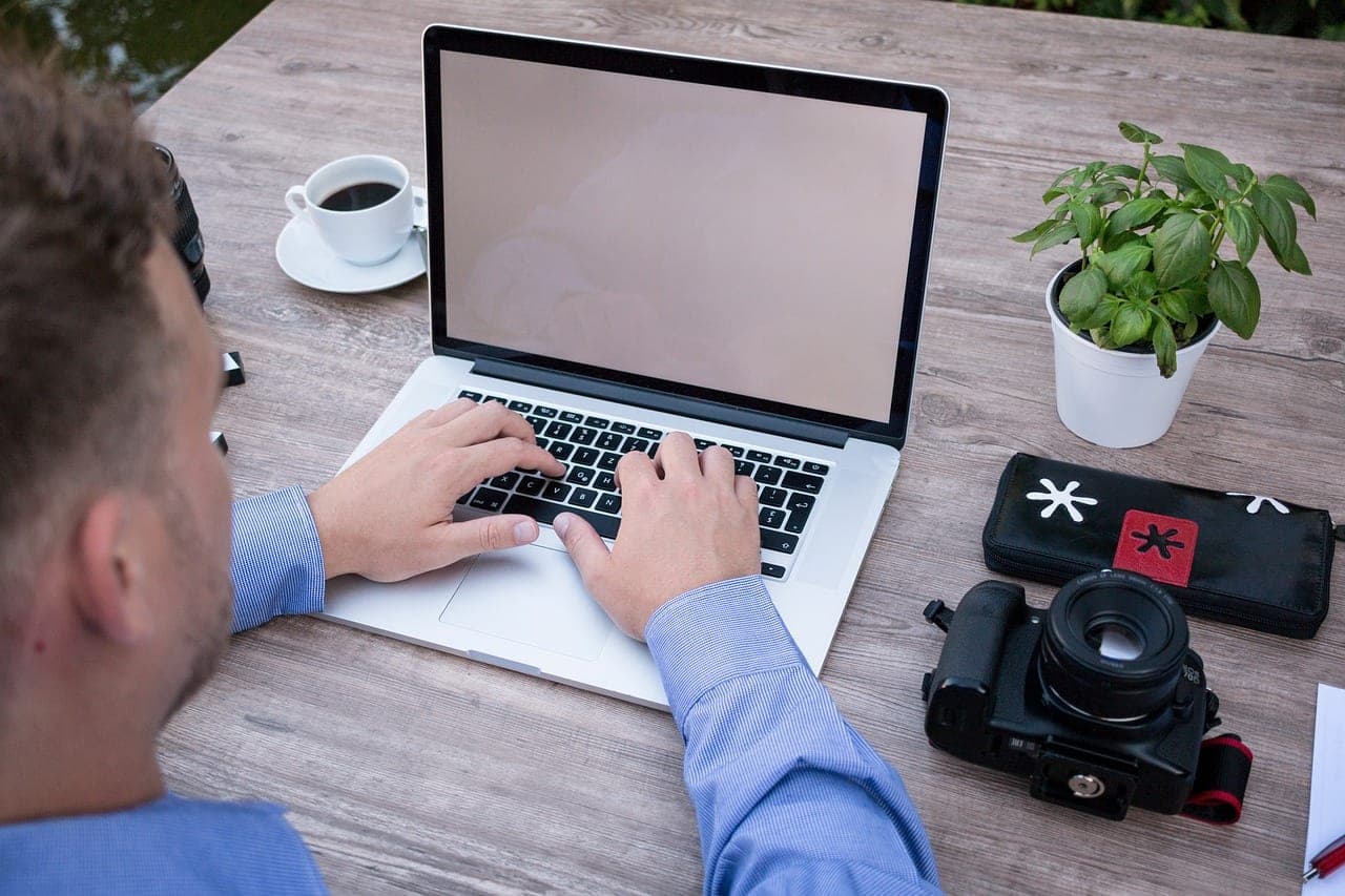 A laptop showing data spreadsheets used for programmatic SEO