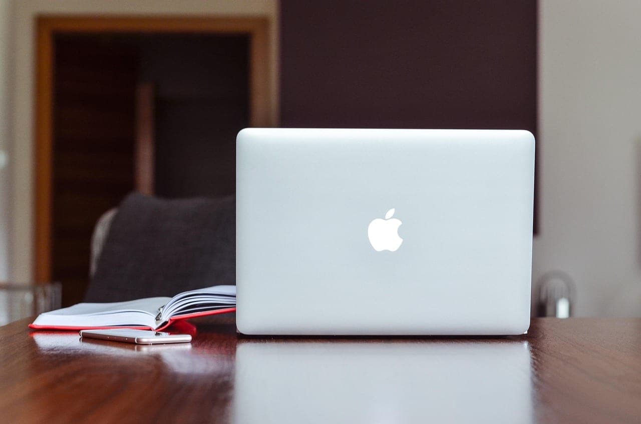 A clean desk setup showing a laptop used for SEO research